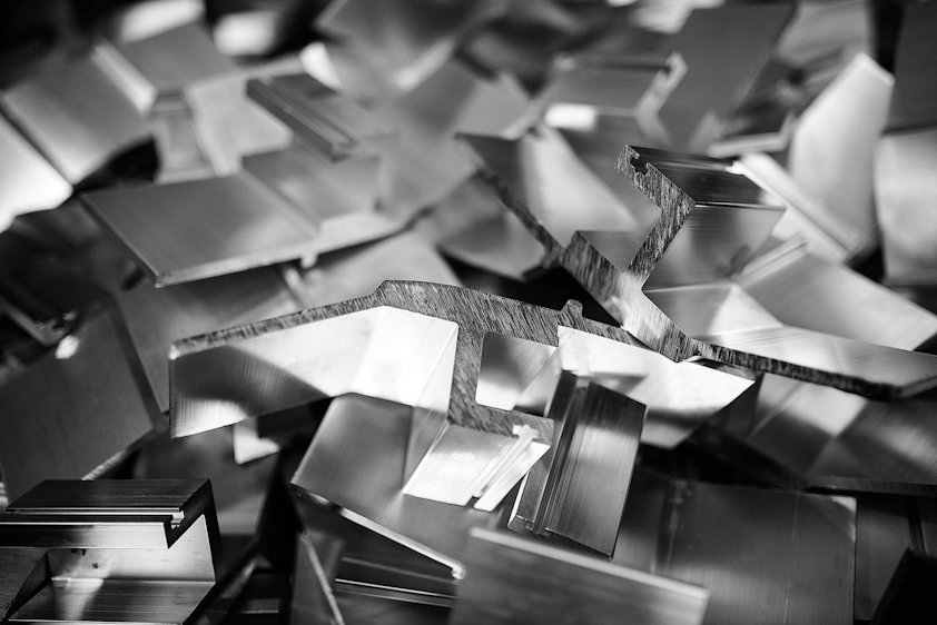 Jumble of small cut aluminum extruded parts