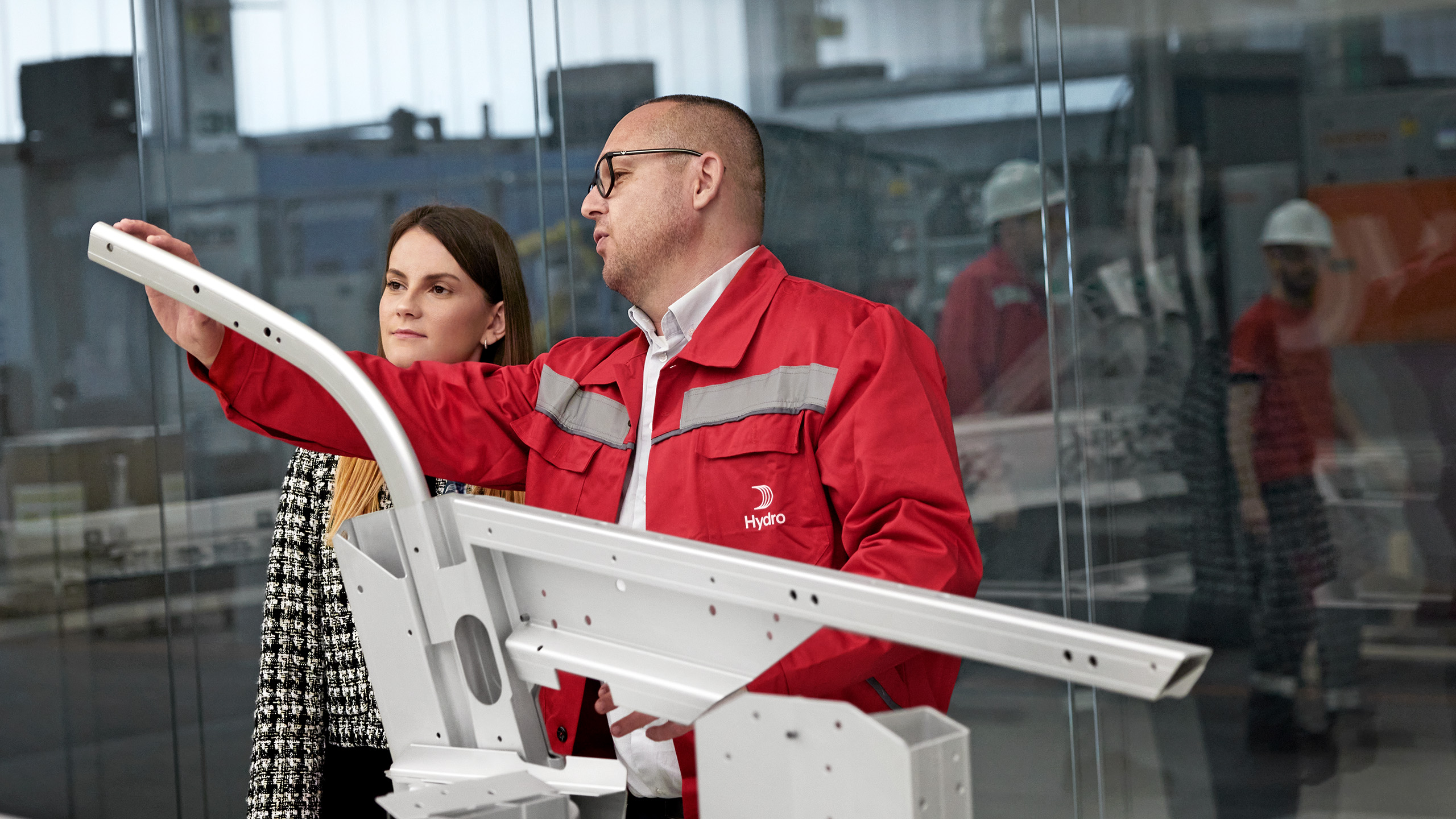 a man and woman in red jackets