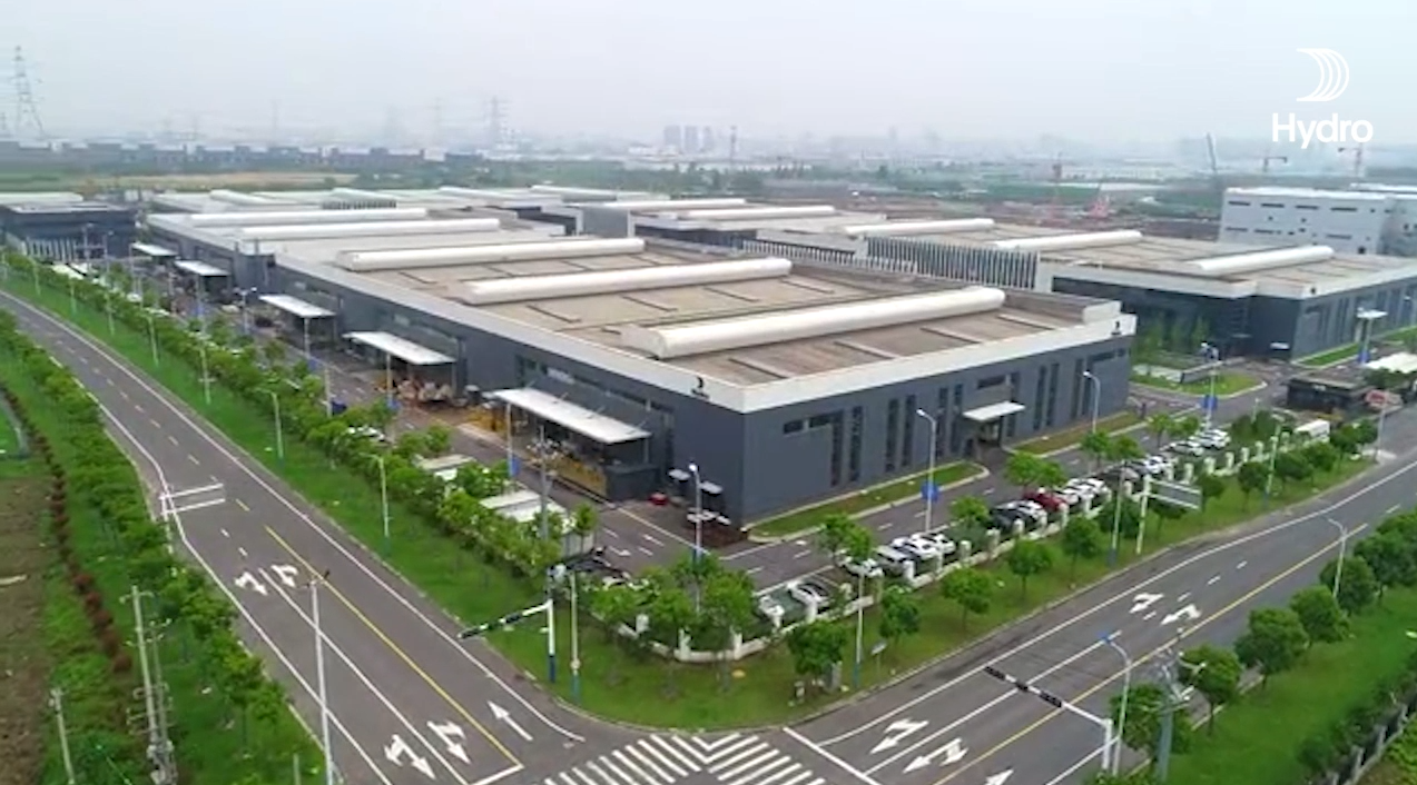 a large building with a parking lot