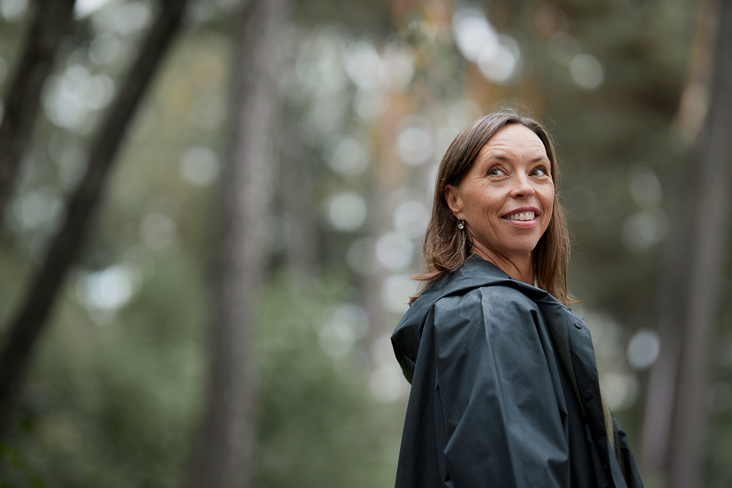 a person smiling outside