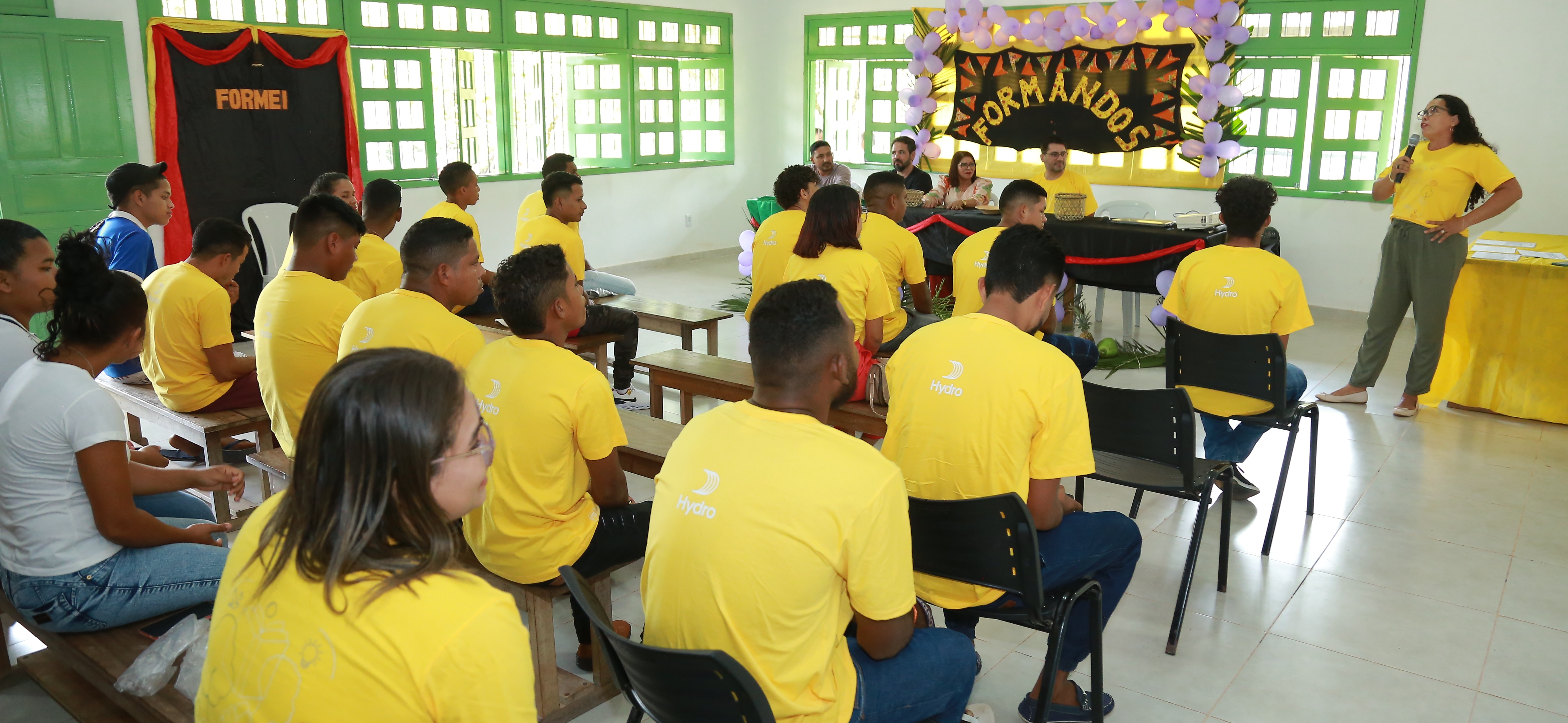 a group of people sitting in a room