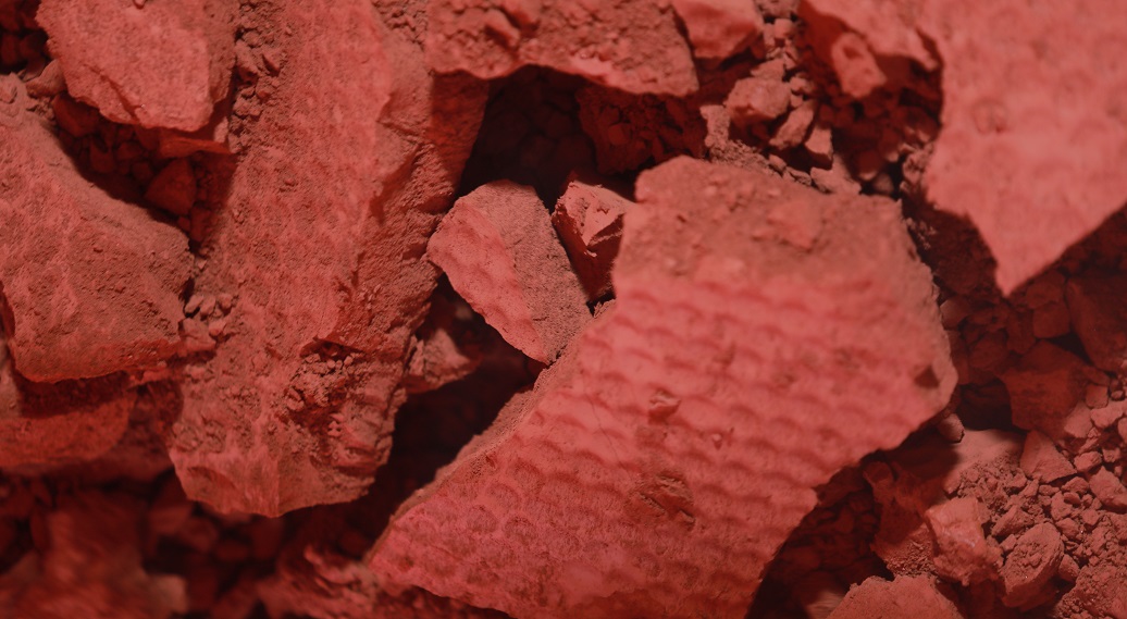 a close up of some red rocks