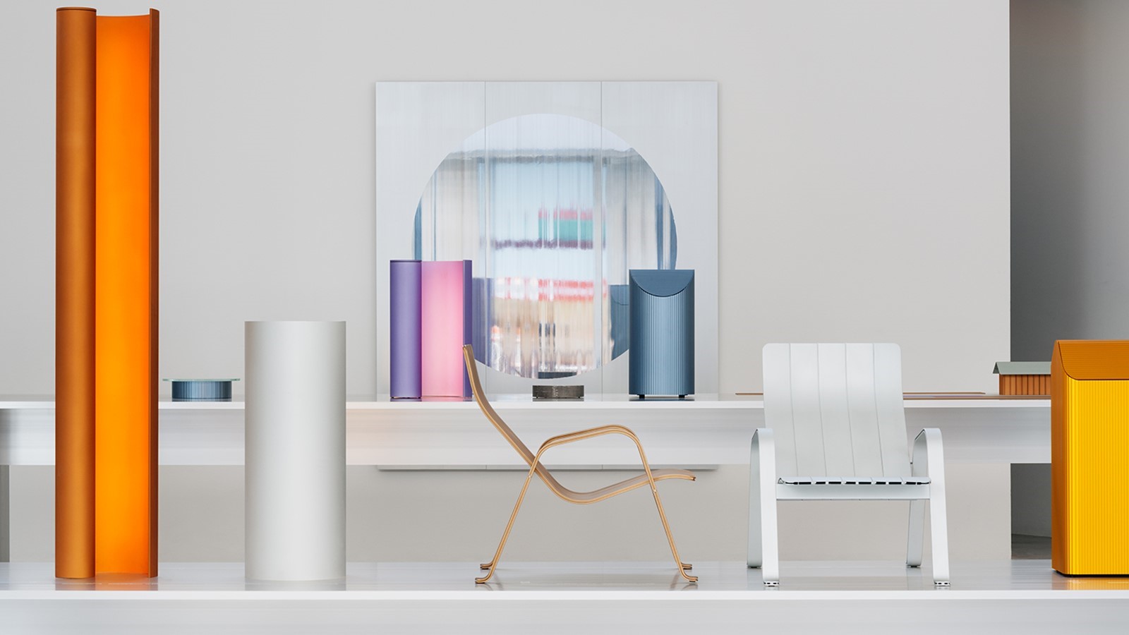 a table with chairs and a glass display